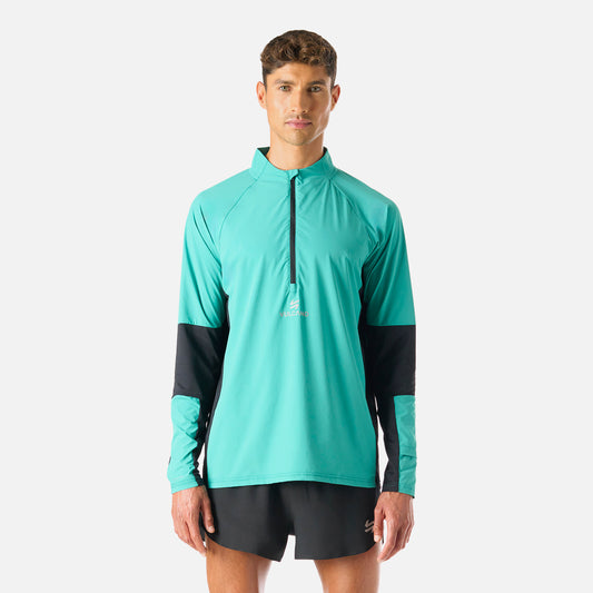 Polerón Hombre Built To Move Pro 1/4 Zip Midlayer Turquesa Vulcano