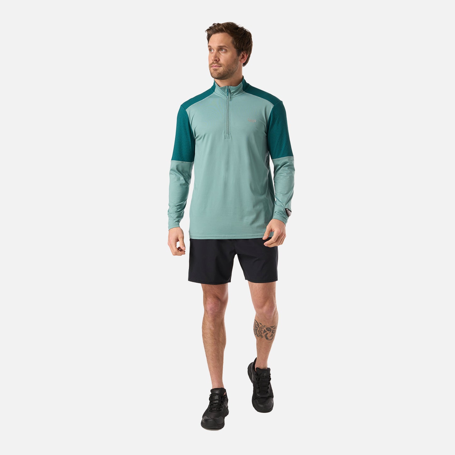 Polerón Hombre Puerto Trucco 1/4 Zip Turquesa Lippi